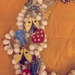 Sassy Jones new without tags white lovebug necklace